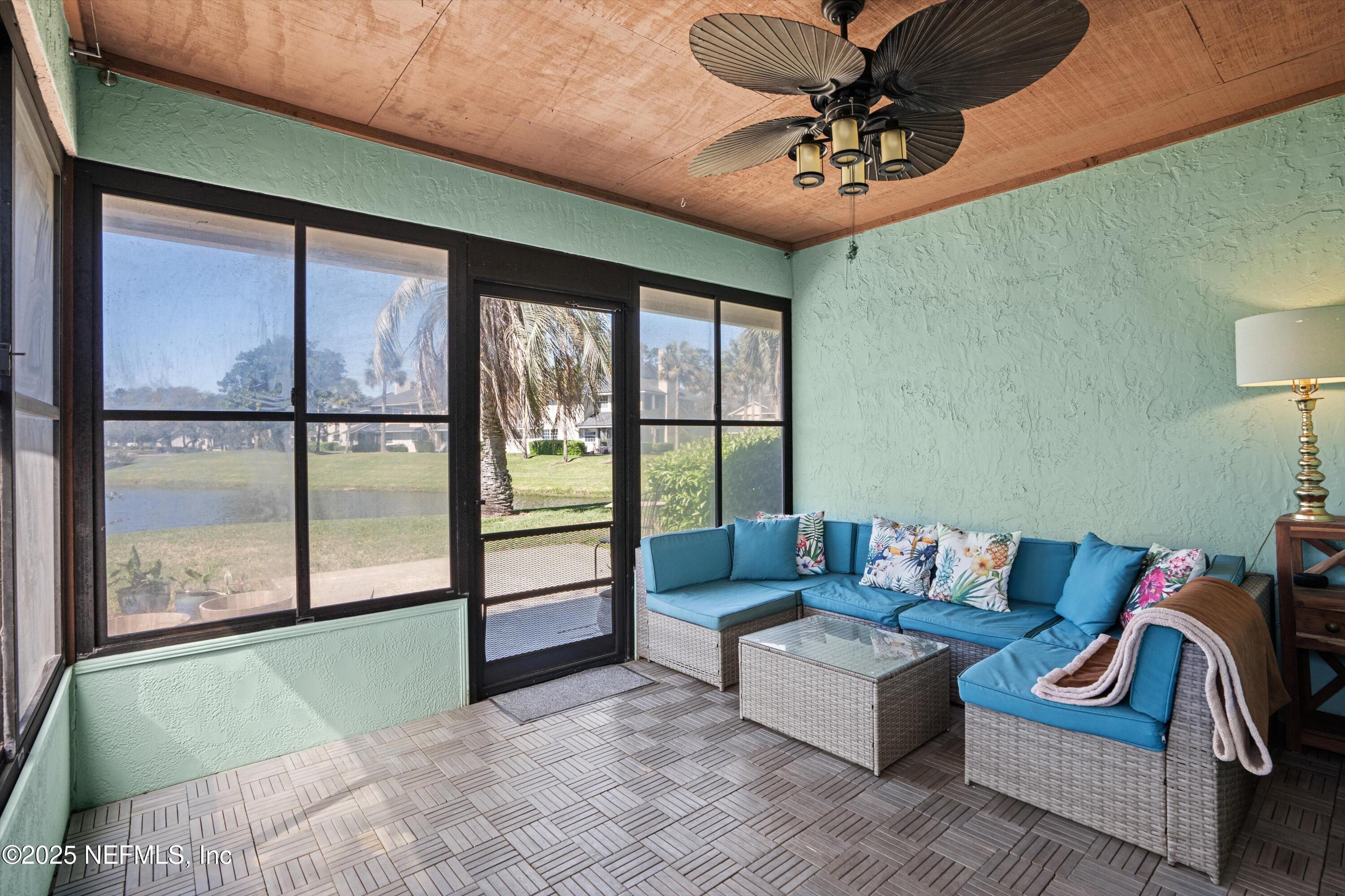 701 Tournament Road Ponte Vedra Beach, FL 32082 - Photo 11 of 28 11-Relaxing Sun Porch with lake view