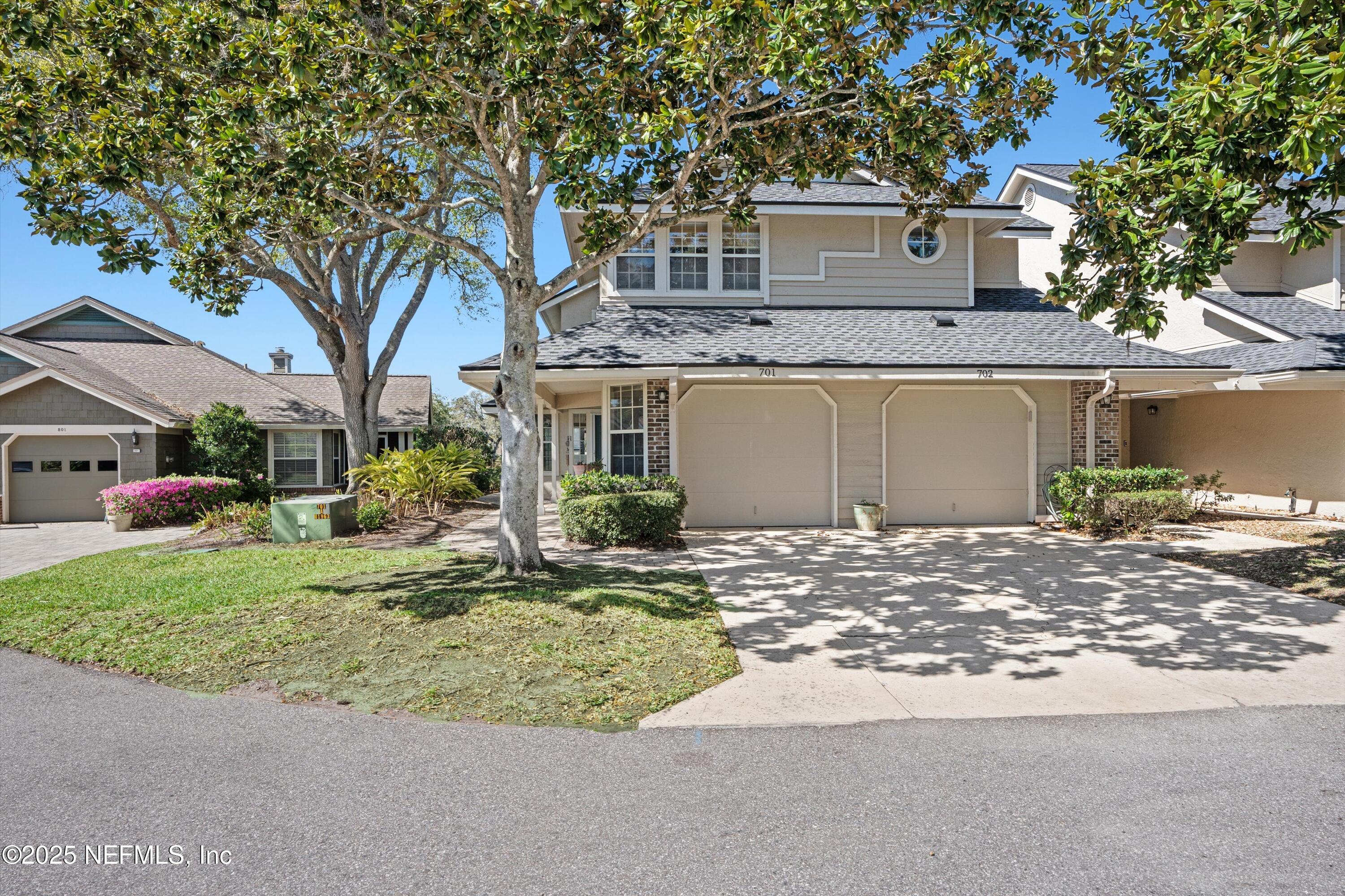 701 Tournament Road Ponte Vedra Beach, FL 32082 - Photo 2 of 28 02-End unit with a garage