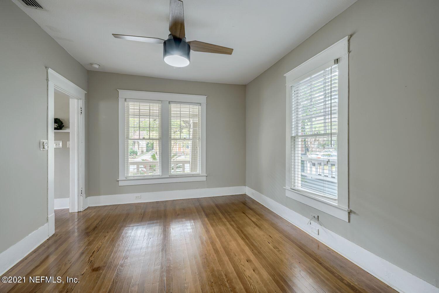 2835 Post Street Jacksonville, FL 32205 - Photo 12 of 30 a view of an empty room with wooden floor and a window