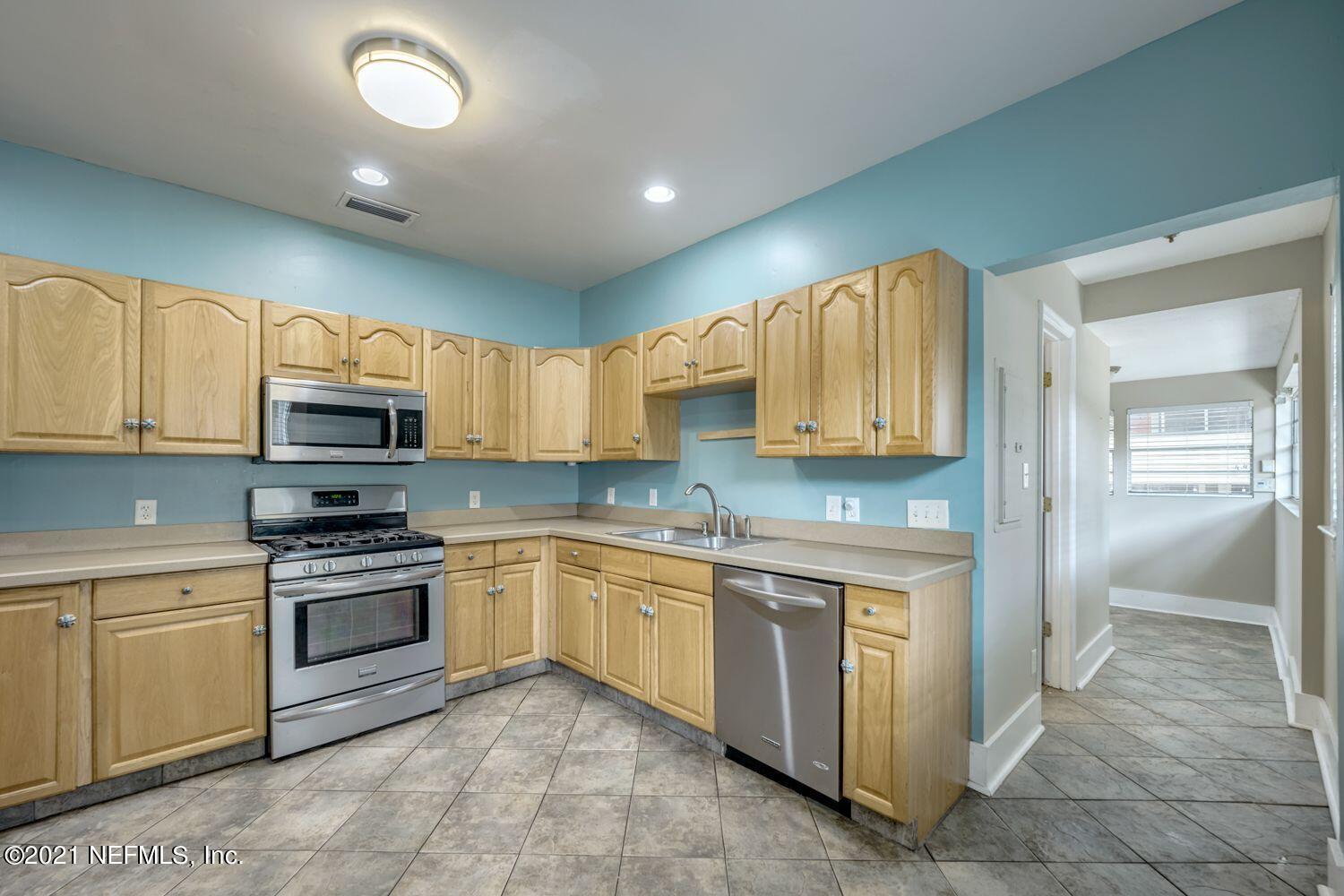 2835 Post Street Jacksonville, FL 32205 - Photo 10 of 30 a kitchen with stainless steel appliances granite countertop a stove top oven a sink and dishwasher