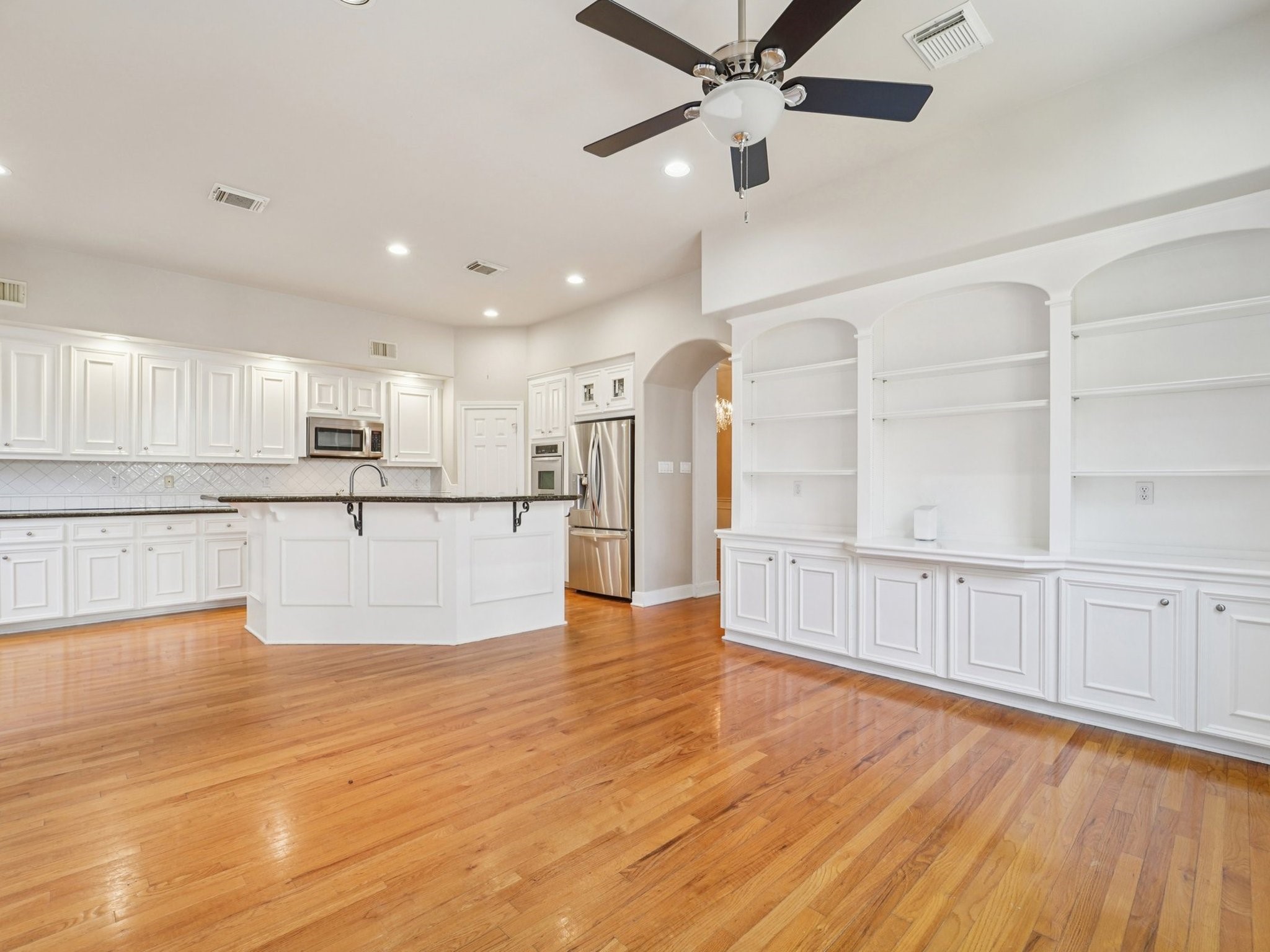 1951 West Clay Street Houston, TX 77019 - Photo 12 of 49 The Family Room also features built-ins, perfect for storing your photos and collectibles.