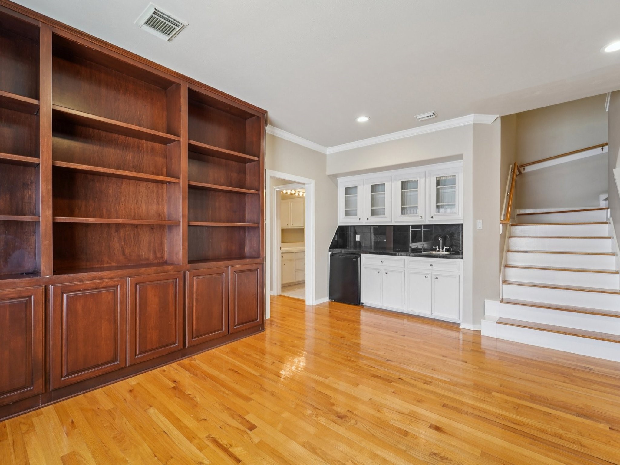 1951 West Clay Street Houston, TX 77019 - Photo 22 of 49 The Study also features a wet bar and beverage chiller.