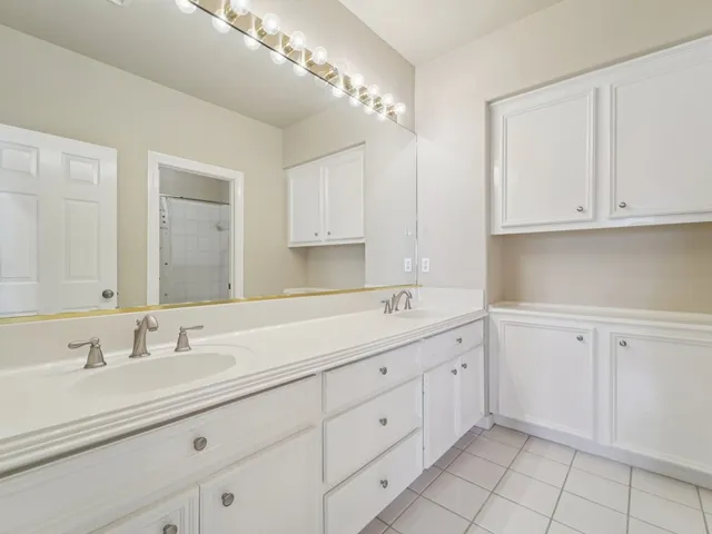 a bathroom with a toilet and a bathtub