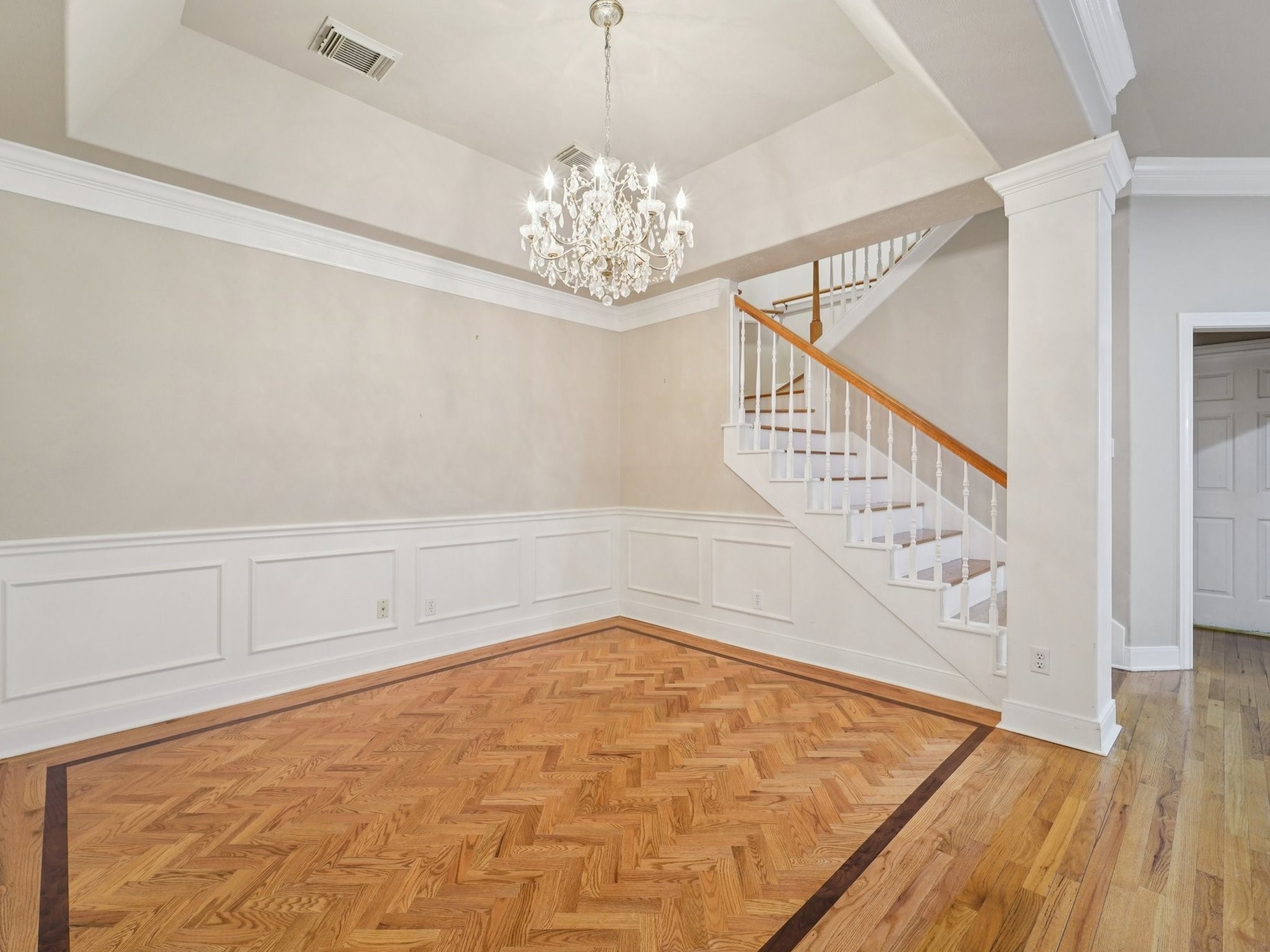 1951 West Clay Street Houston, TX 77019 - Photo 7 of 49 This dining room has a beautiful chandelier that will look marvelous over your dining room table.