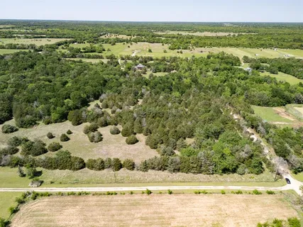 a view of a yard with an ocean
