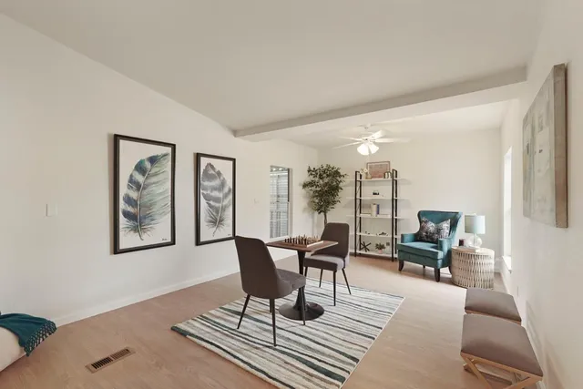 a workspace with furniture and window