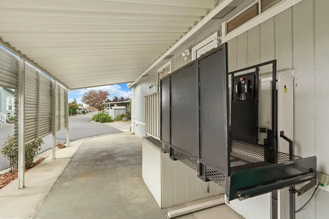 a backyard with potted plants