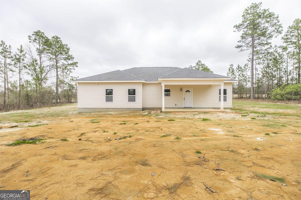 212 Lovett Farm Road East Dublin, GA 31027 - Photo 5 of 26 a house view with a outdoor space