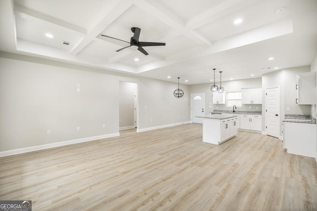 212 Lovett Farm Road East Dublin, GA 31027 - Photo 10 of 26 a view of kitchen with wooden floor