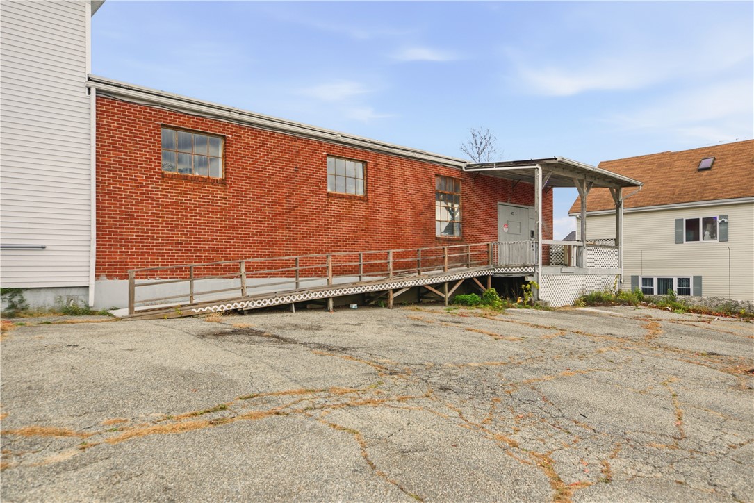 42 Main Road Tiverton, RI 02878 - Photo 39 of 46 South Parking Lot with Ramp to Building and Loading Dock