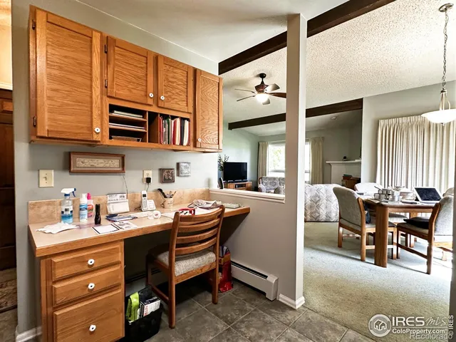 a dinning table and chairs in a room