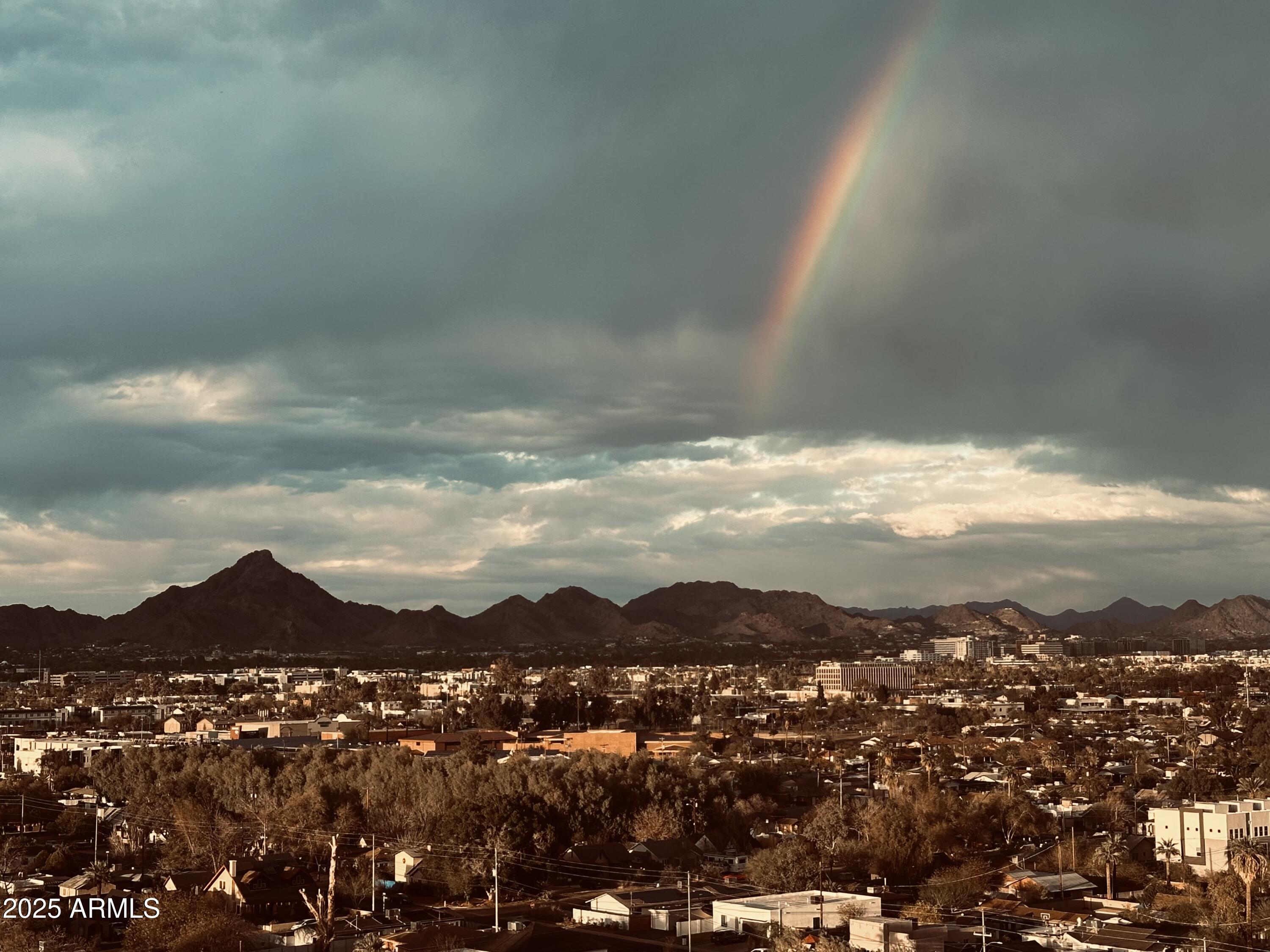 1040 East Osborn Road, Unit 1103 Phoenix, AZ 85014 - Photo 43 of 49 a view of a city with mountain