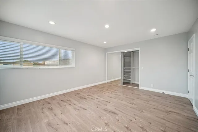 a bathroom with a sink vanity and a mirror