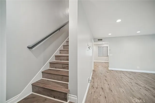 a view of entryway with wooden floor