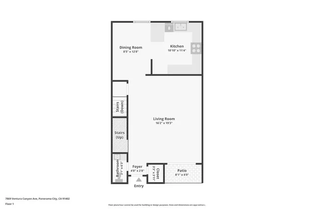 an aerial view of residential houses with outdoor space and parking
