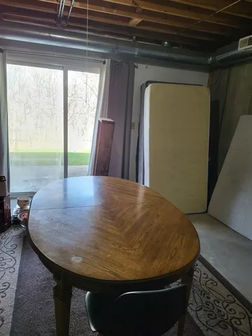 a view of a swimming pool with an outdoor seating