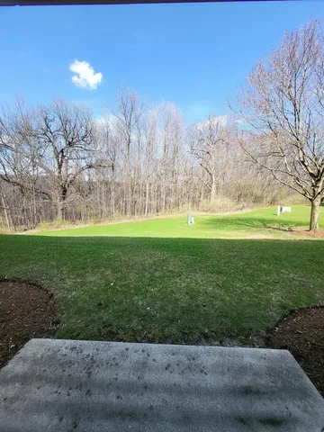 a view of a golf course with a yard
