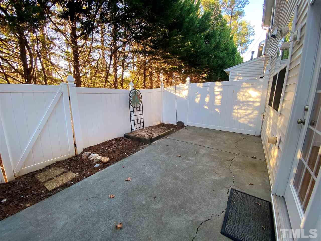 8235 Martello Lane Raleigh, NC 27613 - Photo 14 of 14 a view of a backyard