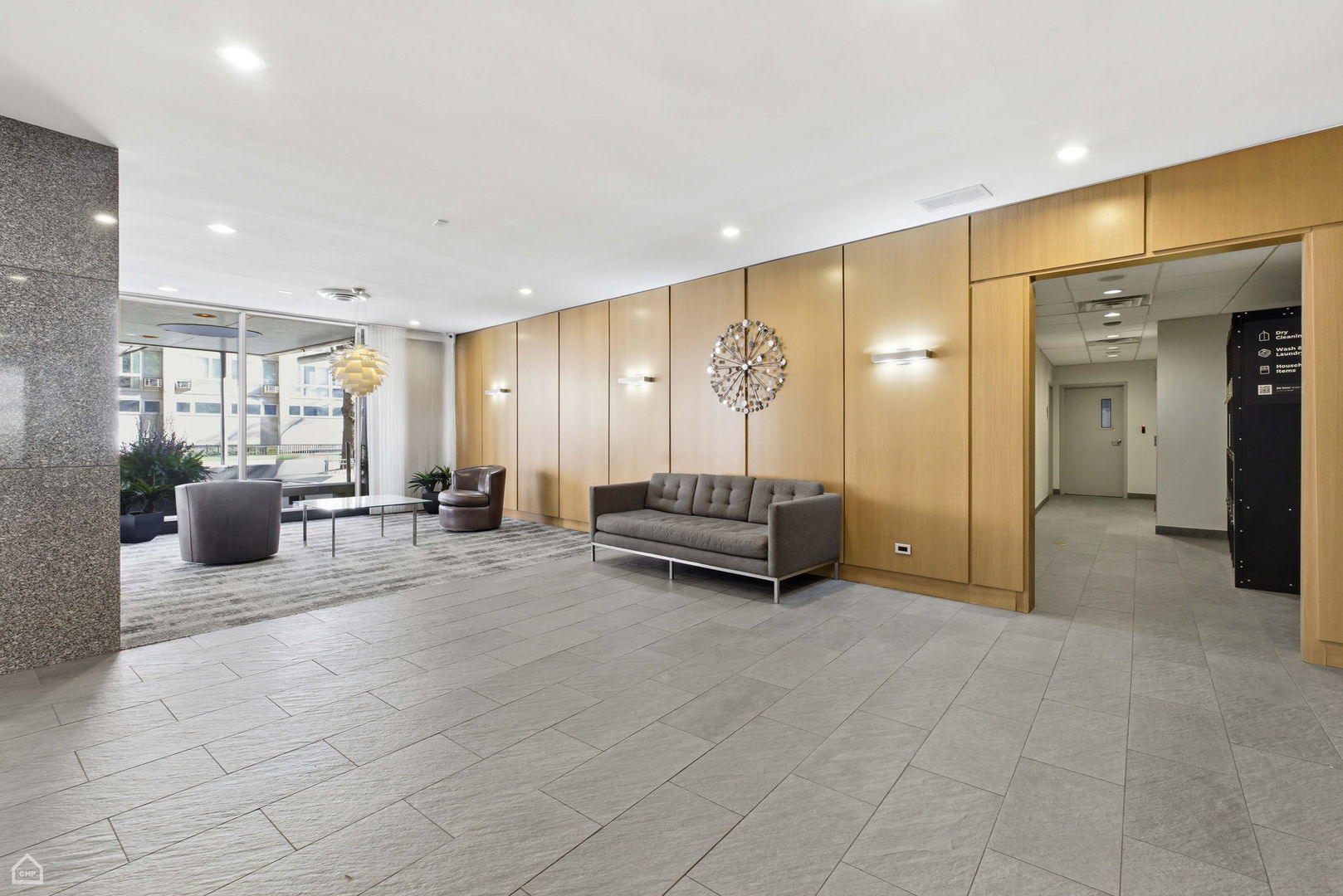 2930 North Sheridan Road, Unit 302 Chicago, IL 60657 - Photo 11 of 14 a view of a livingroom with furniture and a ceiling fan