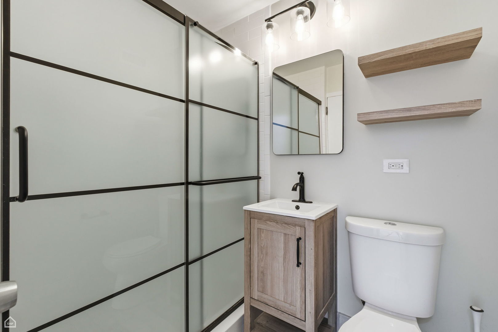 2930 North Sheridan Road, Unit 302 Chicago, IL 60657 - Photo 7 of 14 a view of a hallway with washer and dryer