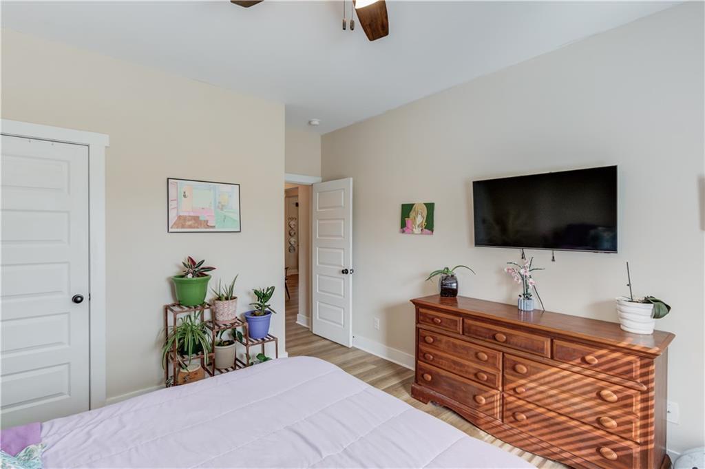 612 Quail Court Good Hope, GA 30641 - Photo 22 of 40 a living room with furniture and a flat screen tv