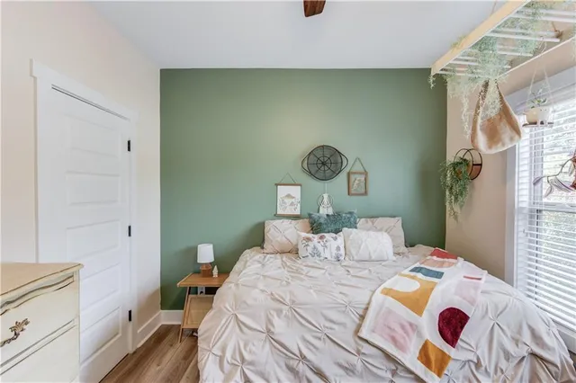 a bedroom with a bed and a cabinets