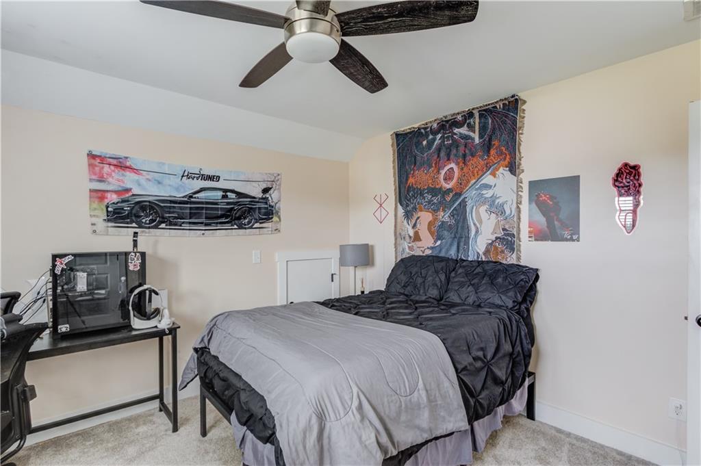 612 Quail Court Good Hope, GA 30641 - Photo 28 of 40 a bedroom with a bed and cabinets