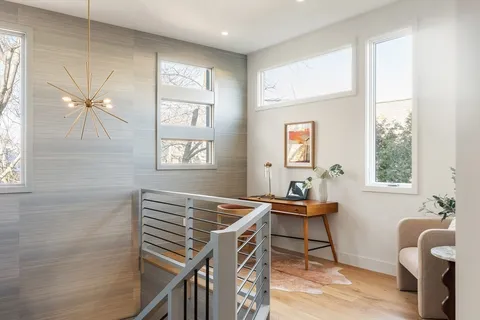 a view of a house with a snow in the yard