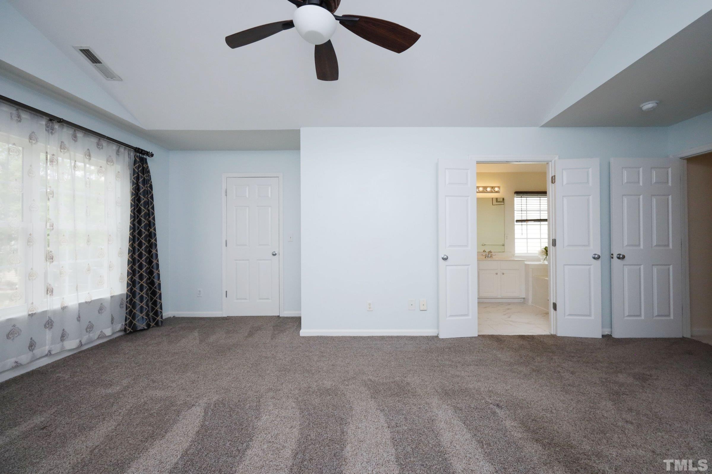 8416 Aztec Dawn Court Raleigh, NC 27613 - Photo 21 of 39 an empty room with windows and closet
