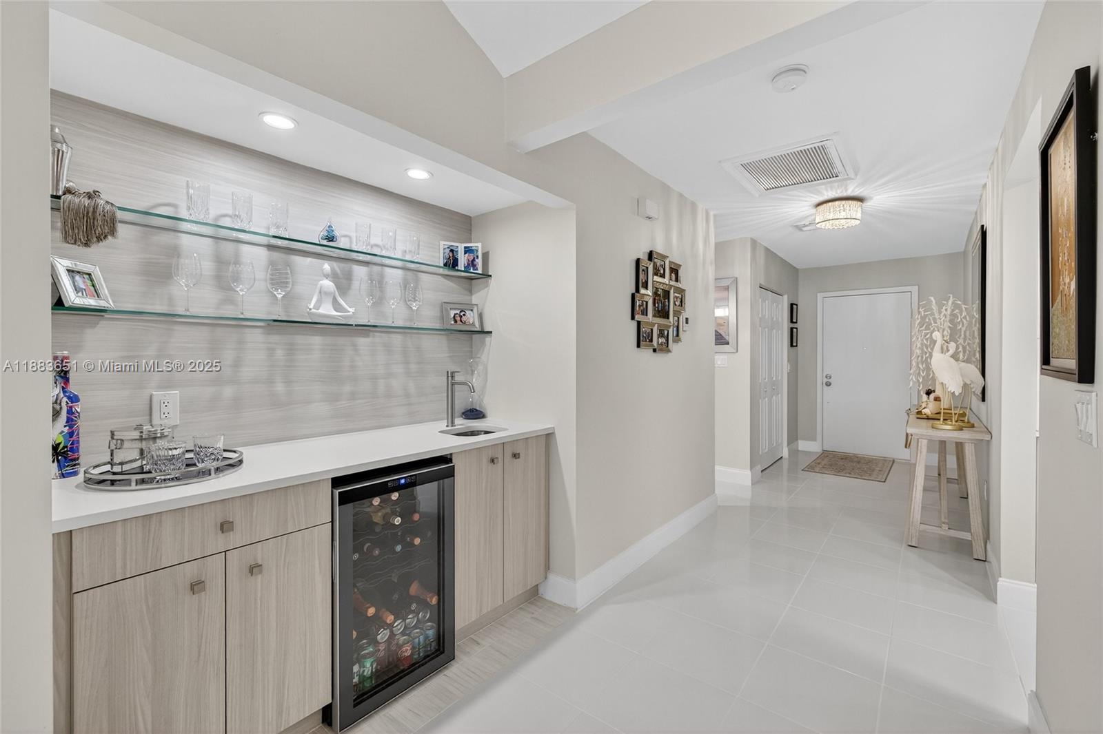 21695 Arriba Real Boca Raton, FL 33433 - Photo 18 of 61 a kitchen with a sink and cabinets