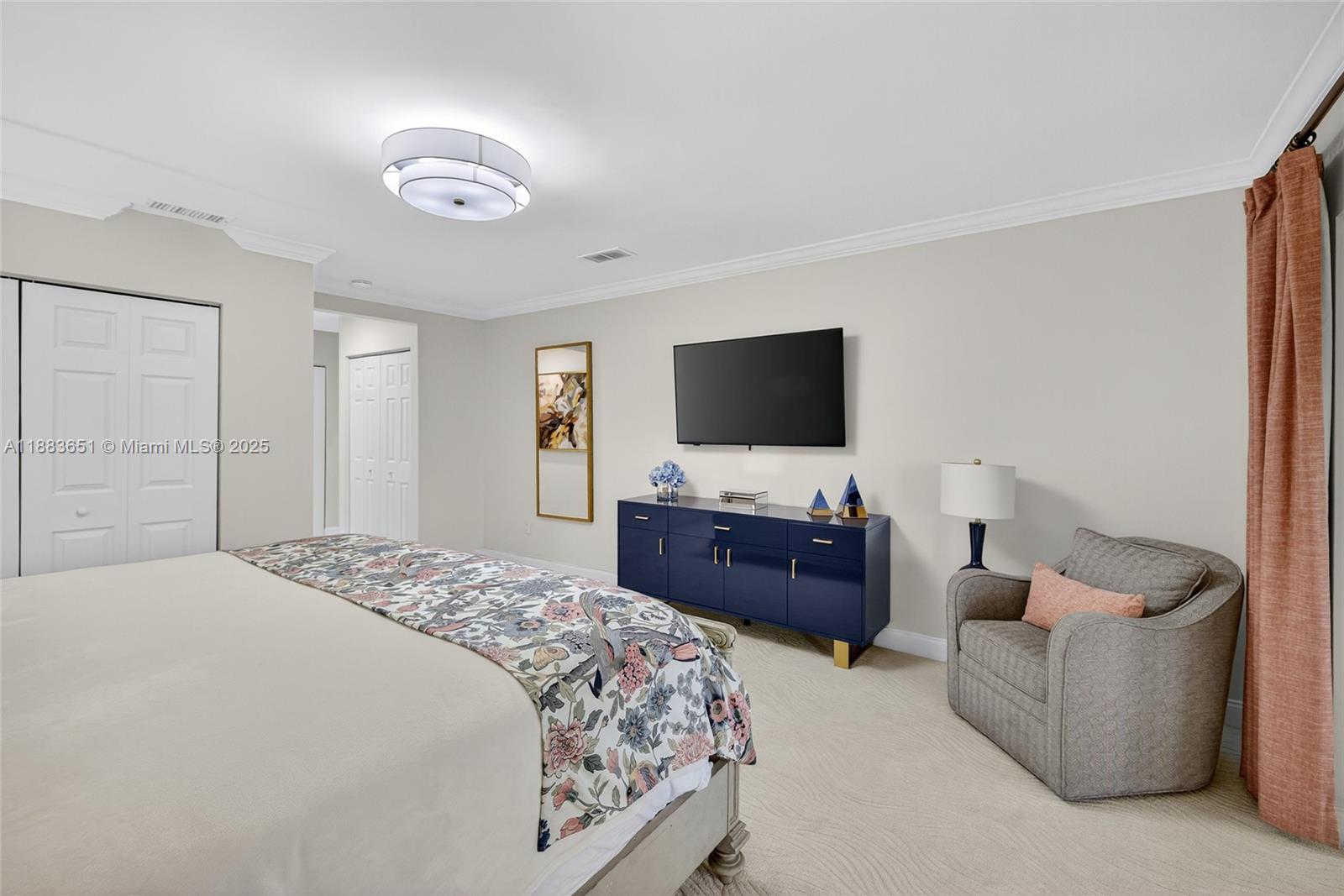 21695 Arriba Real Boca Raton, FL 33433 - Photo 21 of 61 a bedroom with a bed and a flat screen television