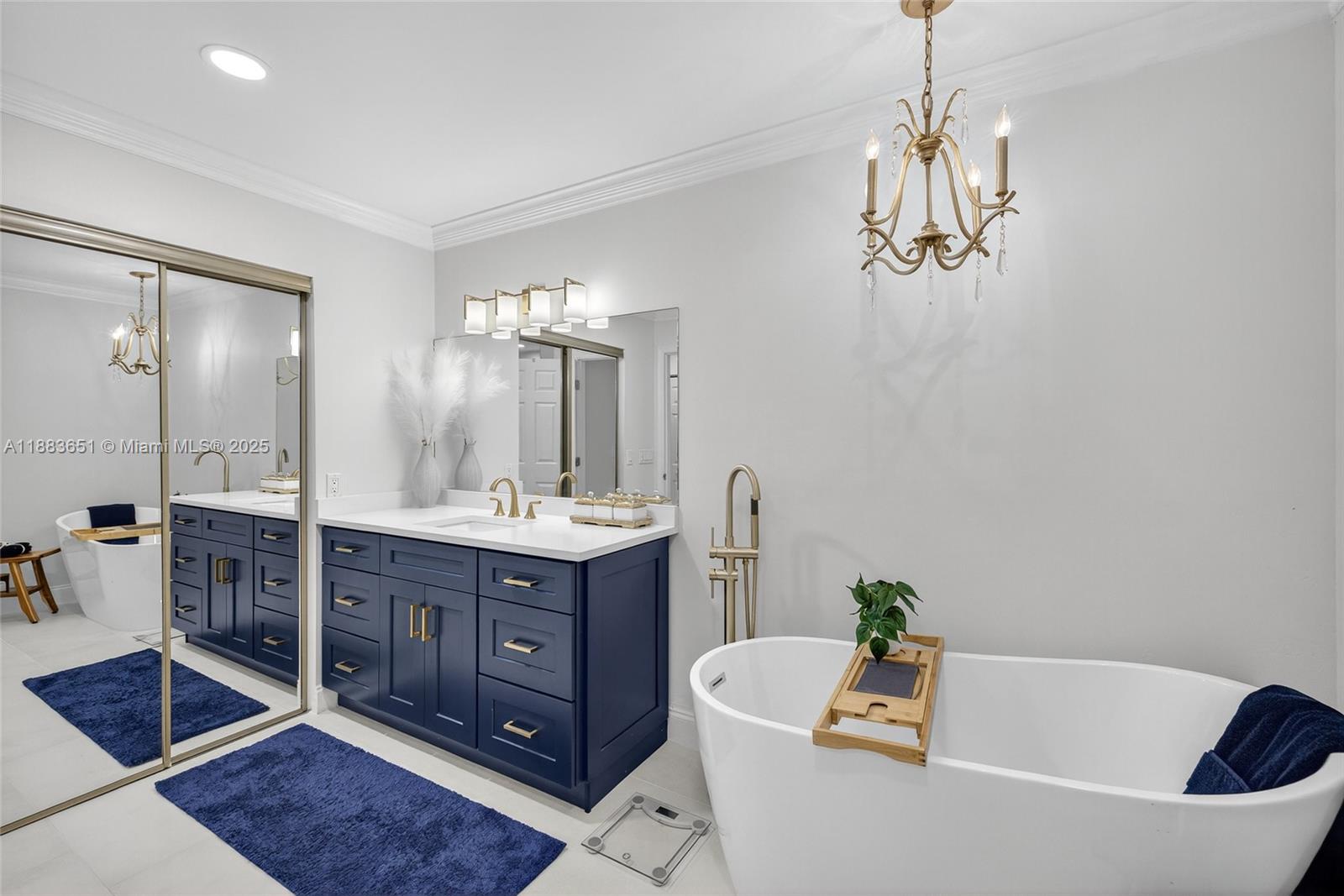 21695 Arriba Real Boca Raton, FL 33433 - Photo 27 of 61 a spacious bathroom with a tub sink and mirror