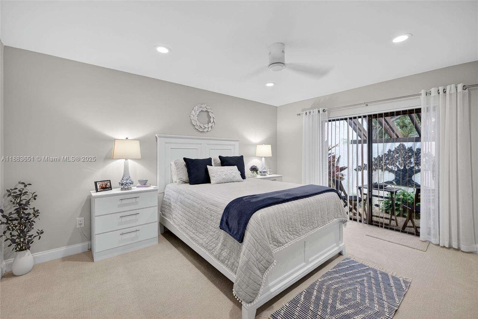 21695 Arriba Real Boca Raton, FL 33433 - Photo 30 of 61 a bedroom with a large bed and a window