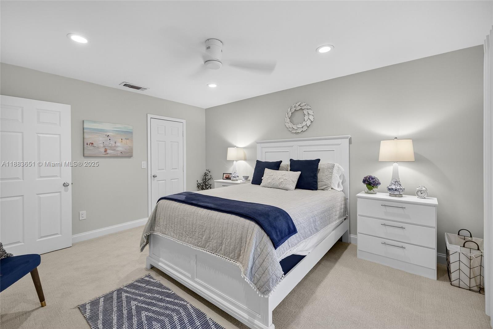 21695 Arriba Real Boca Raton, FL 33433 - Photo 32 of 61 a bedroom with a bed and a night stand