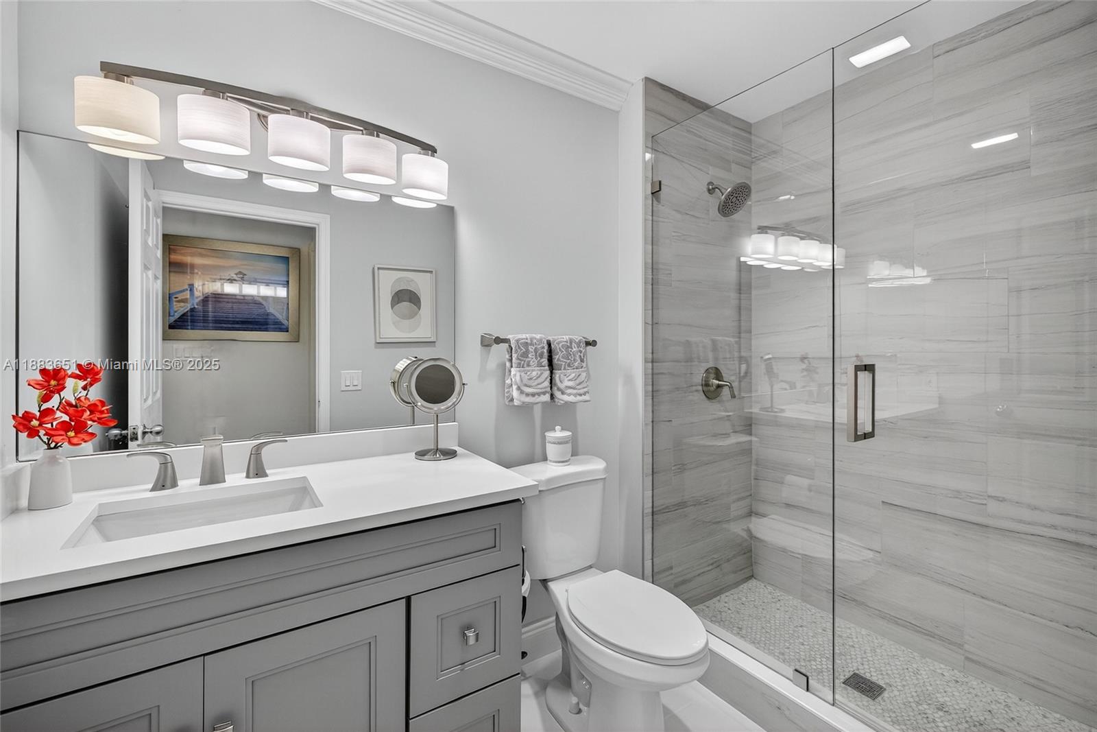 21695 Arriba Real Boca Raton, FL 33433 - Photo 33 of 61 a bathroom with a sink toilet and shower