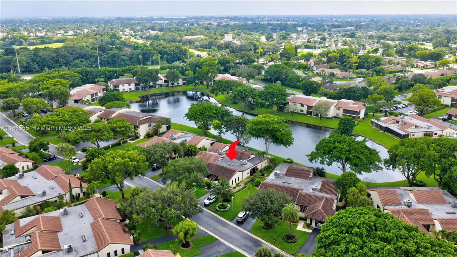 21695 Arriba Real Boca Raton, FL 33433 - Photo 53 of 61 an aerial view of house with yard swimming pool and green space