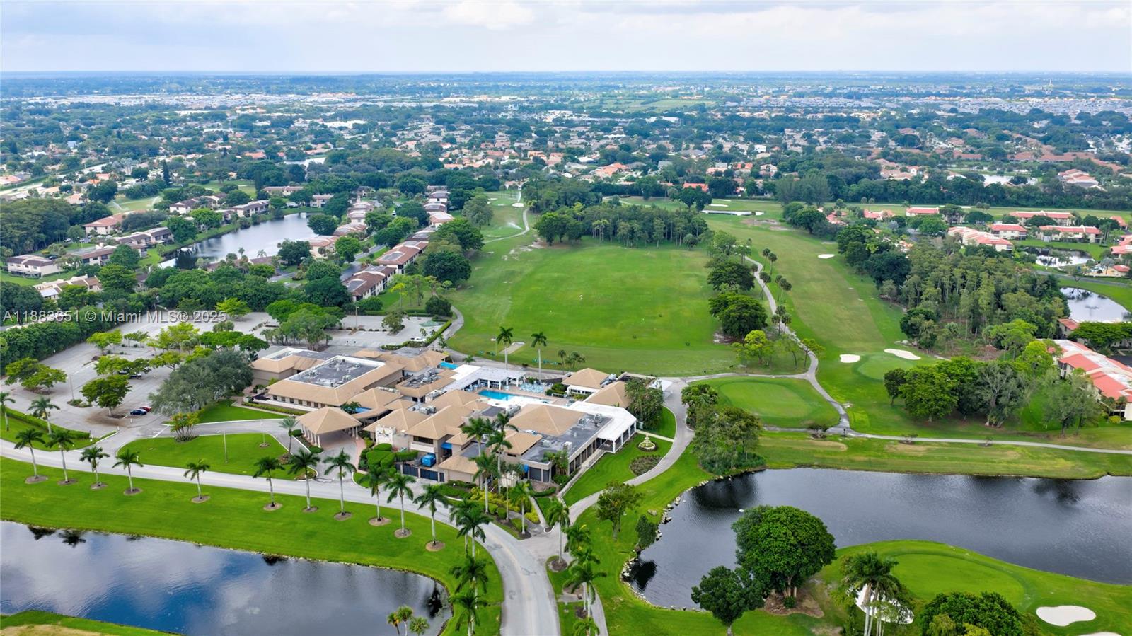 21695 Arriba Real Boca Raton, FL 33433 - Photo 59 of 61 an aerial view of a houses with a lake view