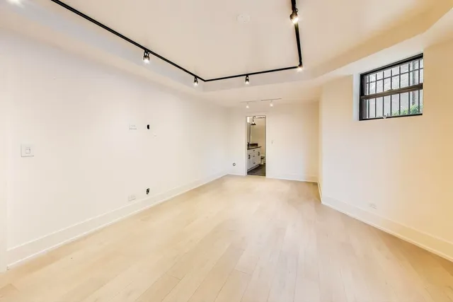 a view of a room with a hallway