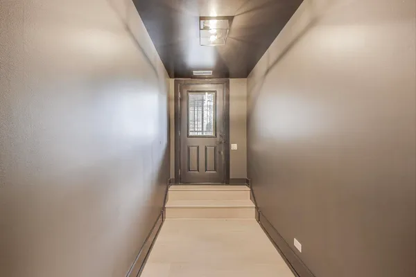 a picture of a bathroom with a shower and a mirror