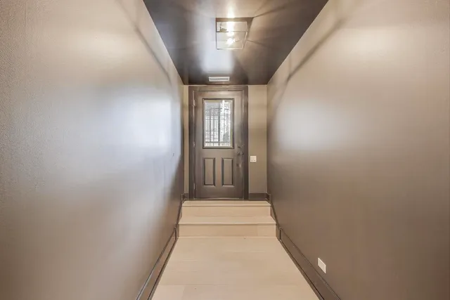 a picture of a bathroom with a shower and a mirror