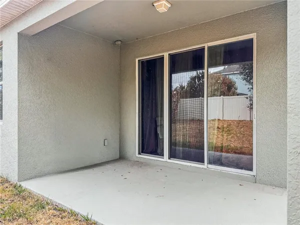 a view of an empty room with window