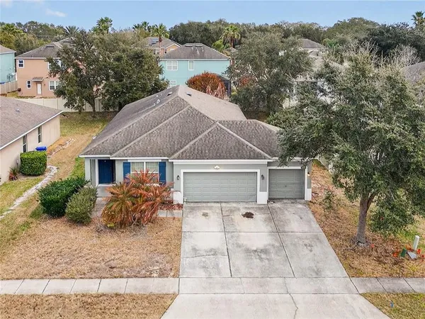 front view of a house with a yard