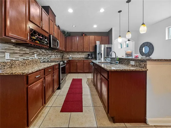 a kitchen with lots of counter space and a sink
