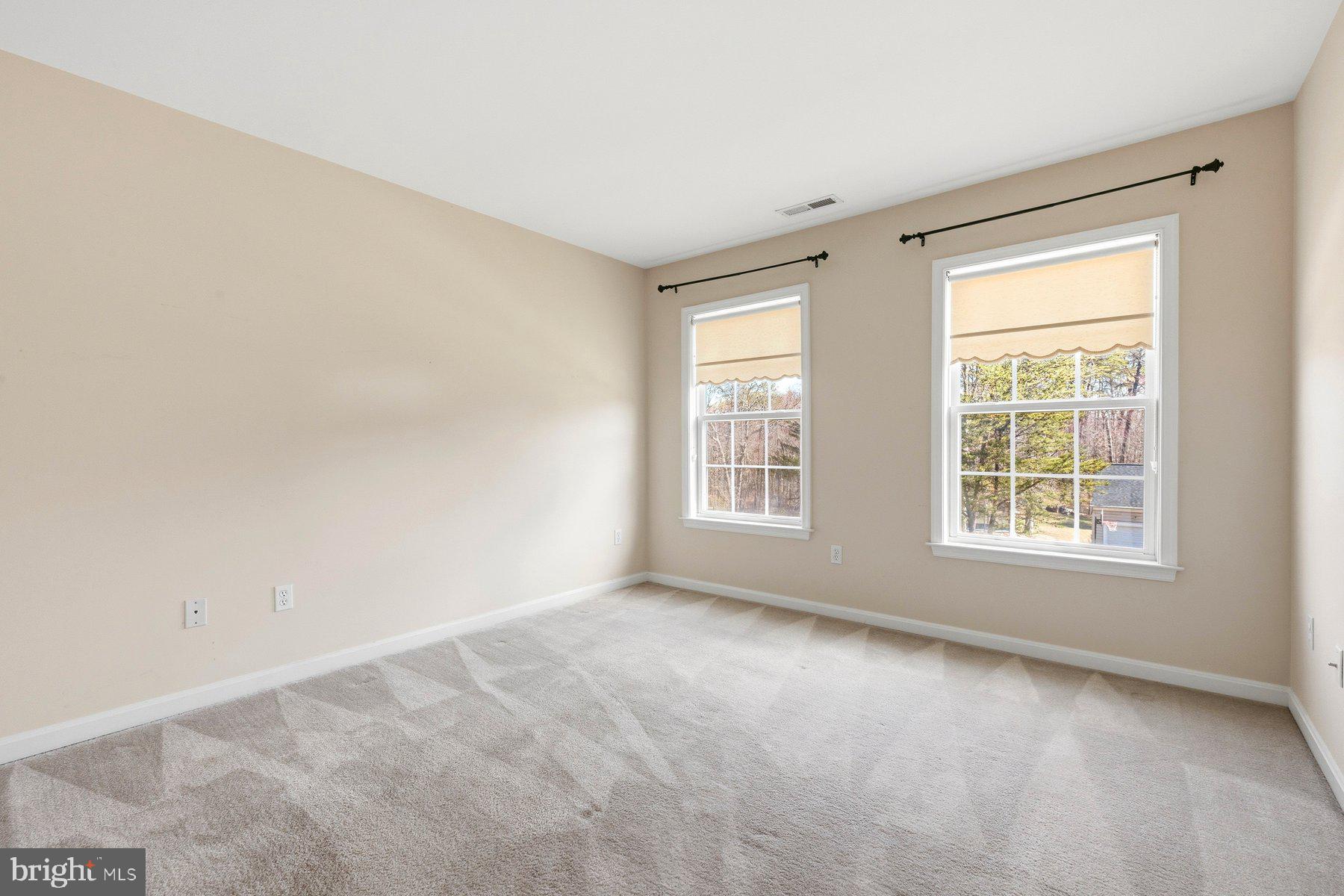 7810 Grandison Way Severn, MD 21144 - Photo 27 of 50 an empty room with a window