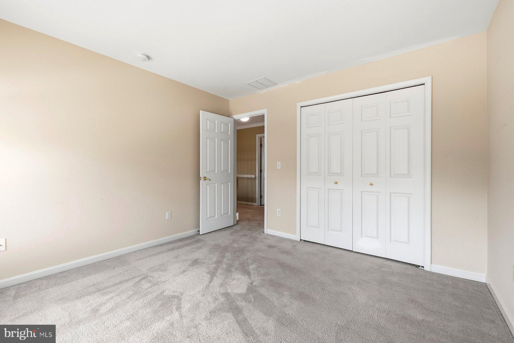 7810 Grandison Way Severn, MD 21144 - Photo 28 of 50 a view of an empty room