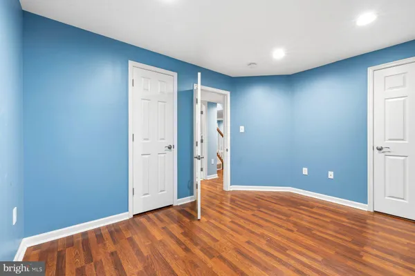 a bathroom with a toilet sink and shower