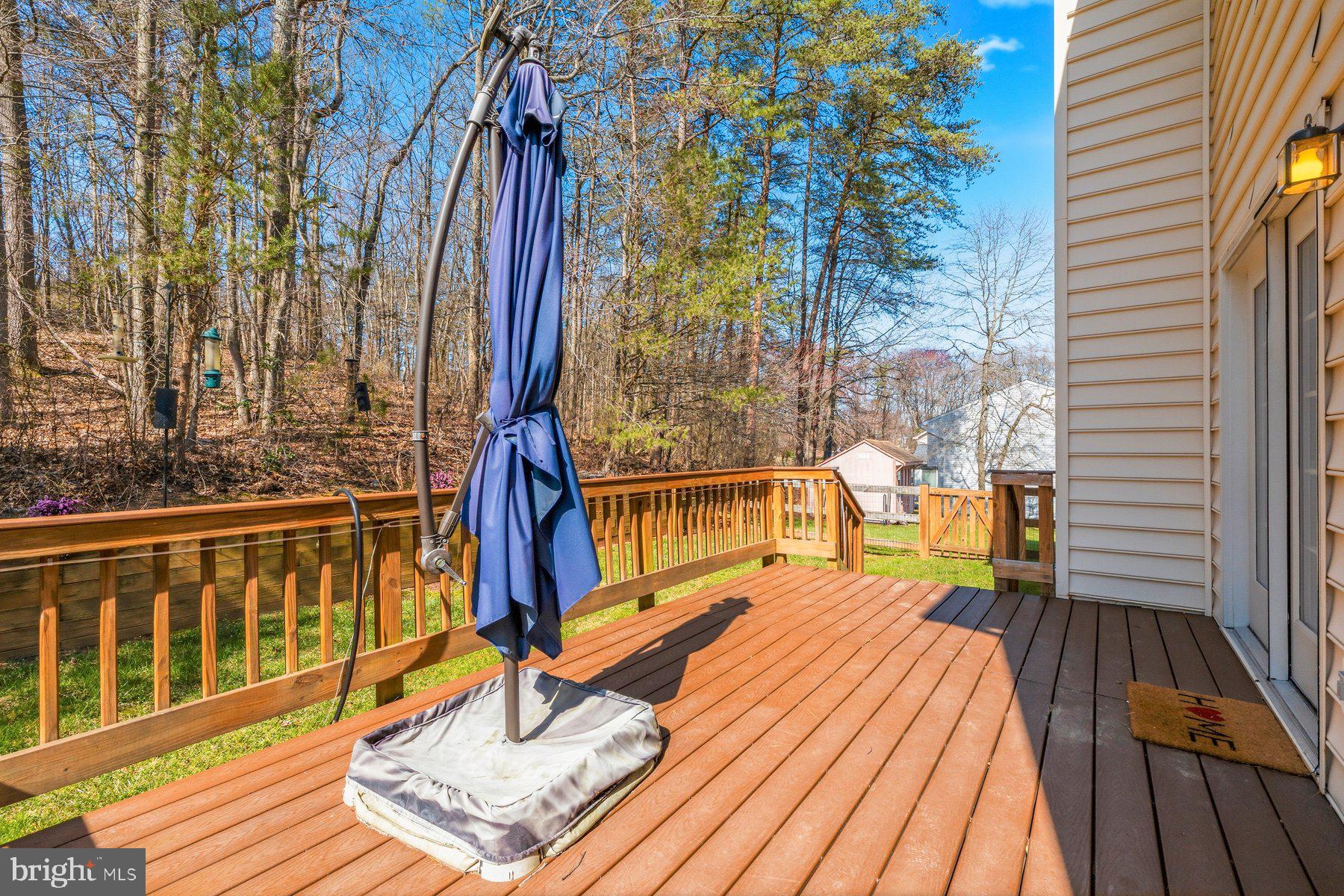 7810 Grandison Way Severn, MD 21144 - Photo 45 of 50 a balcony with chairs and wooden floor