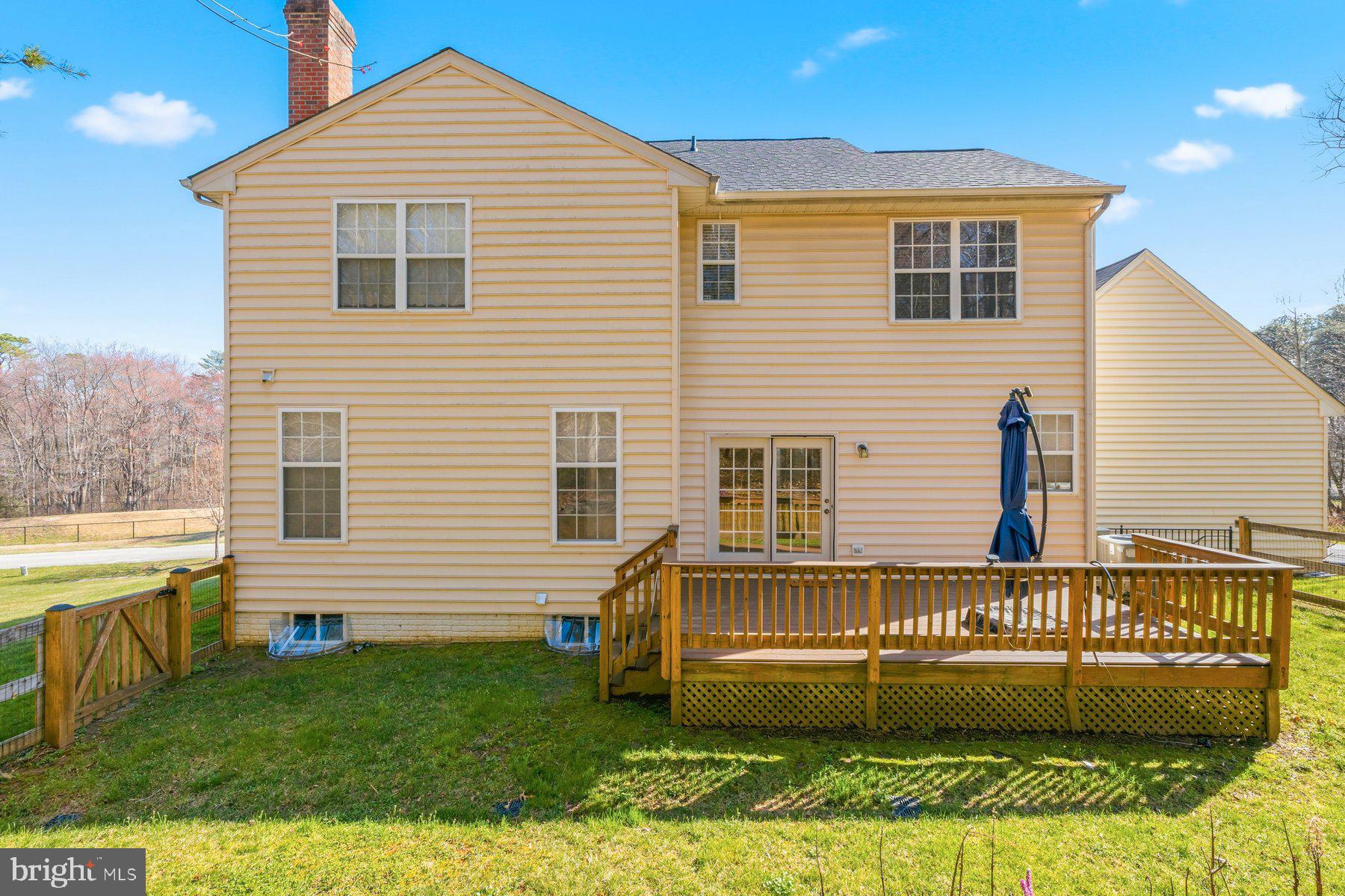 7810 Grandison Way Severn, MD 21144 - Photo 49 of 50 a view of a house with a yard