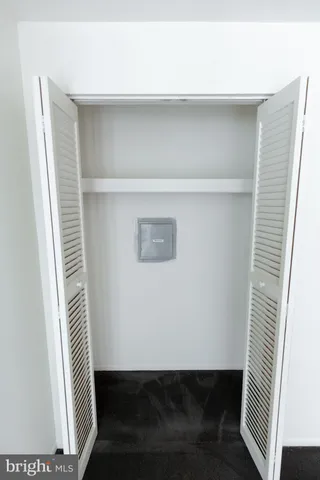 a view of small space with racks on the wall