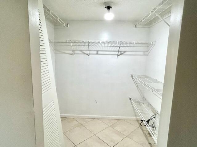741 North Pine Island Road, Unit 303 Plantation, FL 33324 - Photo 17 of 32 a view of a room with racks on the wall